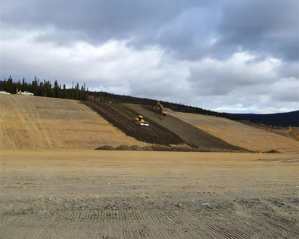 Faro Mine – Construction of cover panel along sidehill.