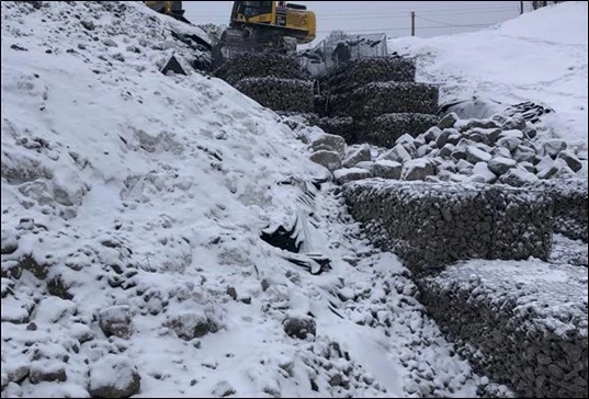 Old Fort, installation of gabion baskets in stream bed