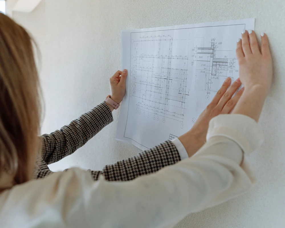 Project team reviewing construction drawings